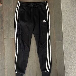 Adidas Black Sweatpants with Iconic Stripes